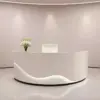 Minimalist-Lacquer-Reception-Desk-Curved-Salon-amp-Boutique-Counter-2.webp Minimalist Lacquer Reception Desk - Curved Salon & Boutique Counter